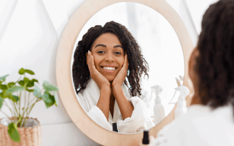 woman-looking-at-herself-in-mirror