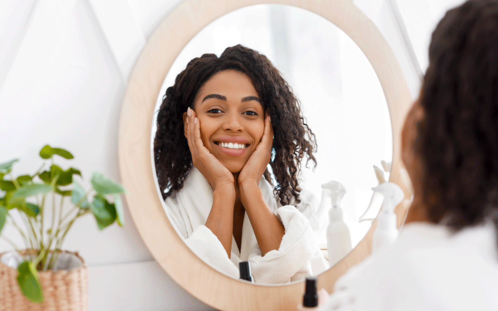 woman-looking-at-herself-in-mirror